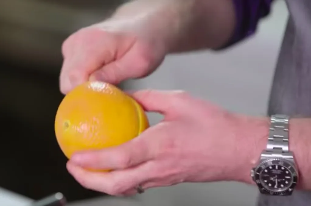 Struggling to peel an orange? Try this spoon trick!