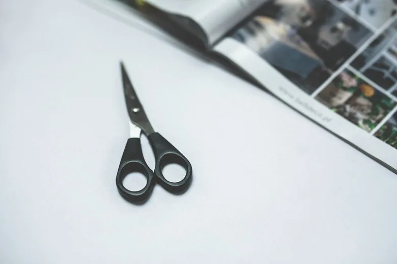 cutting foil with scissors
