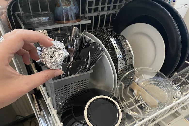 aluminum foil ball in dishwasher