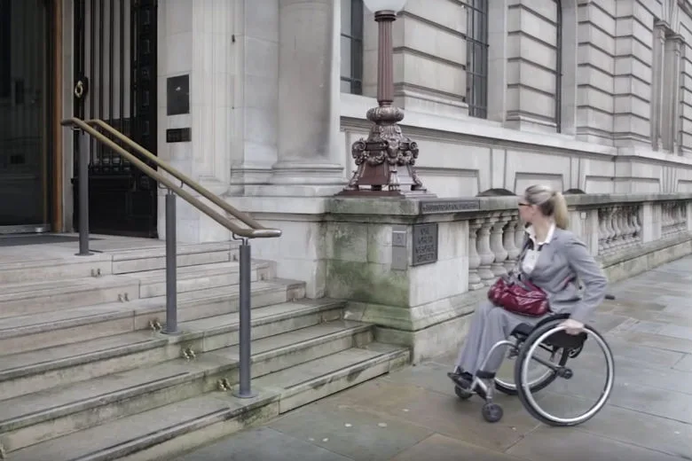 Watch This Wheelchair User Push a Button and Transform Stairs into a Ramp