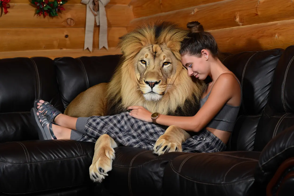 A 21-Year-Old Woman Shares Her Home With a Lion